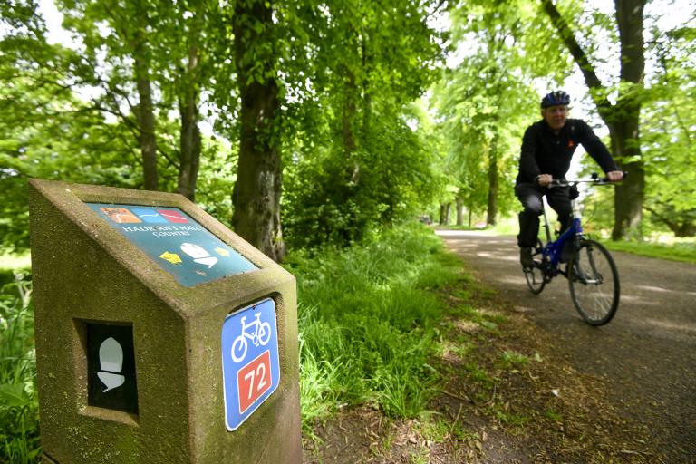 Cyclist on Hadrian's Wall Country path