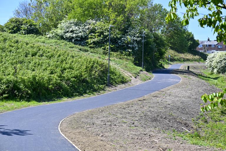 3 metre-wide route for walking, wheeling and cycling through the green space of Vickerstown Park